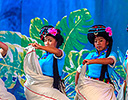 Ethnic Dancers performing Kunming Ethnic Minorities Village Park, China