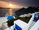 Evening light and bell town and blue church dome, Santorini Greek Isles